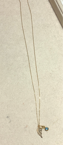 Wing and mati 14k gold necklace