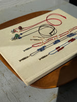 Sardine 14k on Light Blue Silk Cord with Carnelian Beads