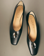 Nora Carre Pumps with Ornament in Black Leather
